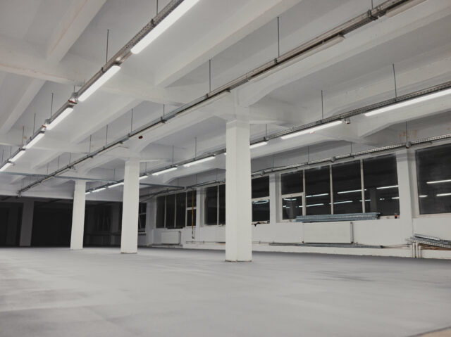 Low angle shot of an industrial hall with led lamps